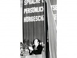 Photo of Dr. Delgado presenting at a conference