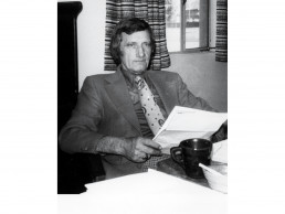 Photo of Little in his office