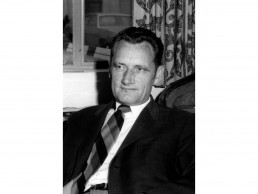 Photo of Little in his office