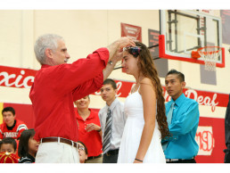 Photo of Dr. Stern crowning Rosina Garcia, Homecoming Queen - 2012