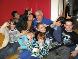 Photo of Students clowning around with Dr. Stern