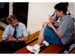 Photo of Dr. Stern chatting with student Mark Ramirez
