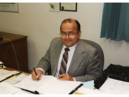 Photo of Dr. Vasishta in his office