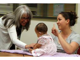 Photo of Dr. Gallegos with baby and mom
